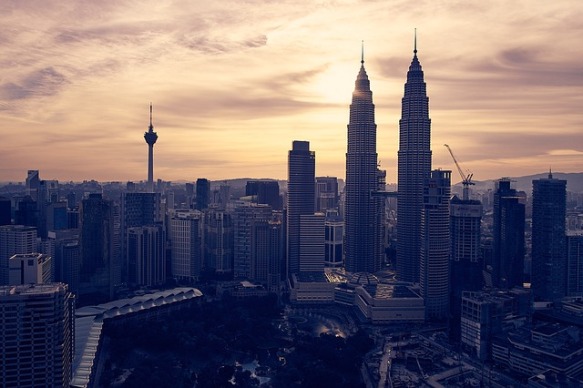 Kuala Lumpur skyscrapers with sun setting